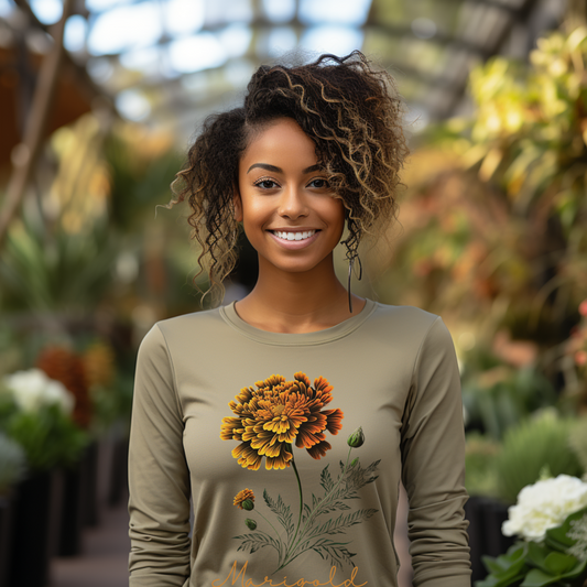 Marigold: A Garden's Natural Defense Long Sleeve Shirt. The front of this soft shirt displays a colorful marigold flower. The back explains the benefits marigold's provide to your organic garden. 